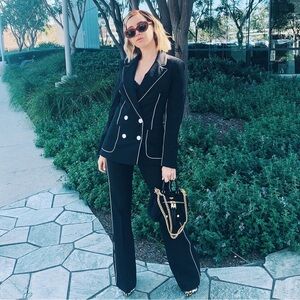 Suit with contrast piping details